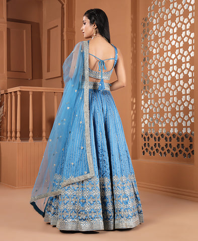 Blue Color Tapeta Silk Silver Zari and Sequins Work Lehenga Choli with Net Dupatta