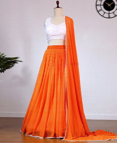 Orange Colored Lehriya Print Georgette Lehenga Choli