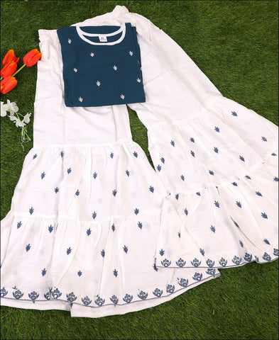 Deep Sea Blue Coloured Rayon Embroidery Work Kurti Set